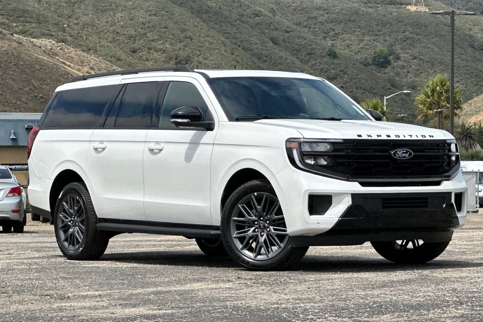 2026 Ford Expedition Max Platinum in Star White Metallic Tri-Coat — front three-quarter view