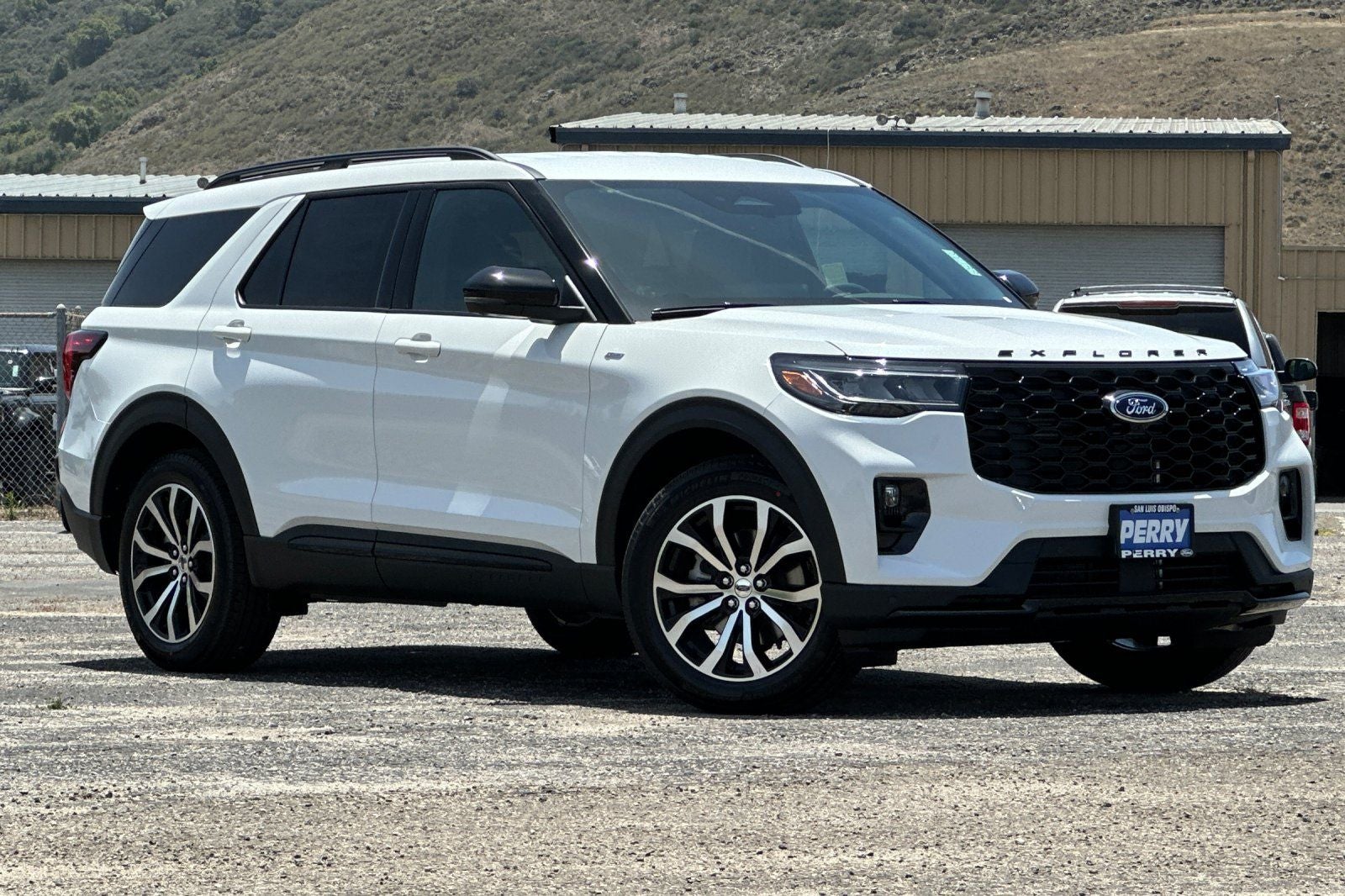 2026 Ford Explorer ST-Line in Star White Metallic Tri-Coat — front three-quarter view