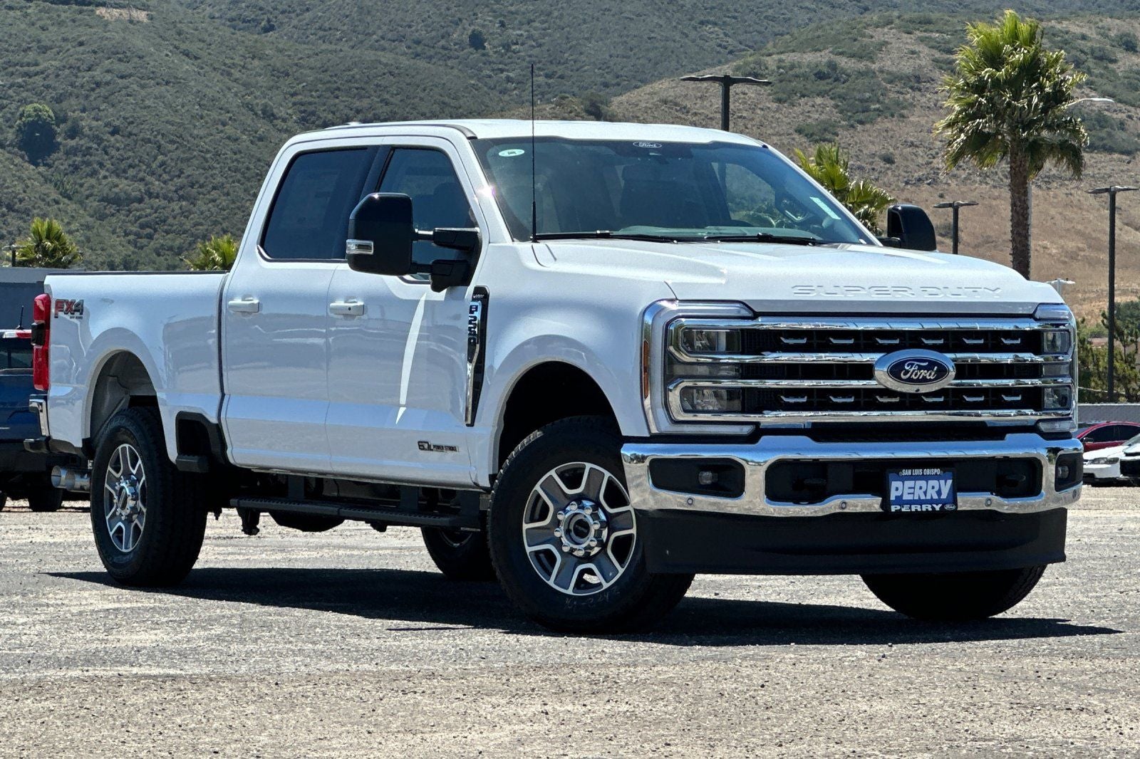 2026 Ford F-250SD Lariat in Oxford White — front three-quarter view