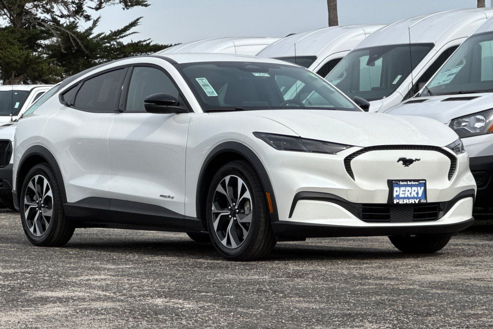 2026 Ford Mustang Mach-E Select in Star White Metallic Tri-Coat — front three-quarter view